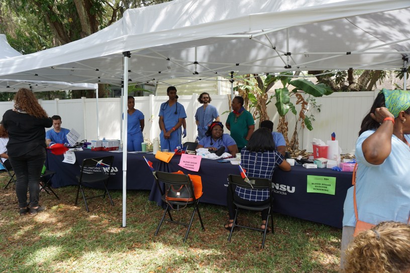 Blood sugar sceening during Haitian flag day celebration